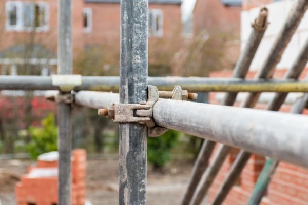 Ensure a party wall agreement is in place before Damage to Property Bentley happens.